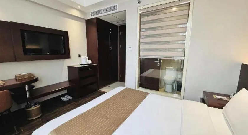 Bed in Maixinge Boutique Hotel Waigaoqiao Free Trade Zone