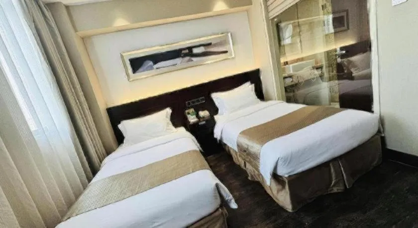 Bed in Maixinge Boutique Hotel Waigaoqiao Free Trade Zone