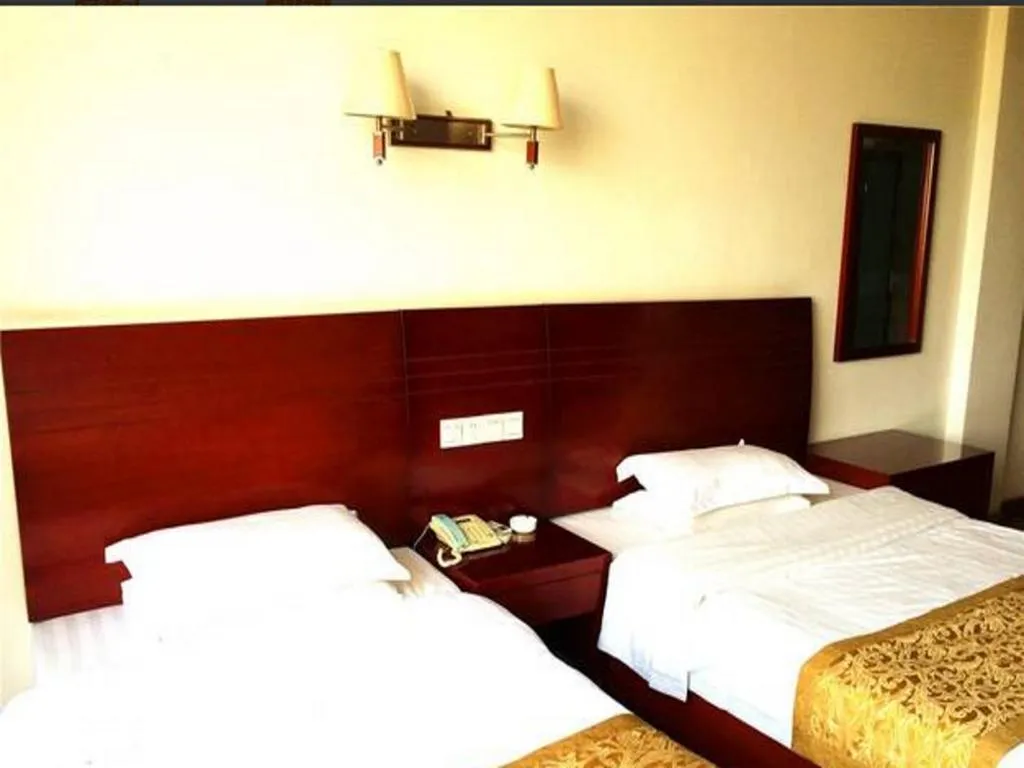 Bed in GreenTree Inn Shangrao Qianshan hekou old town Xinjiang longting shell hotel