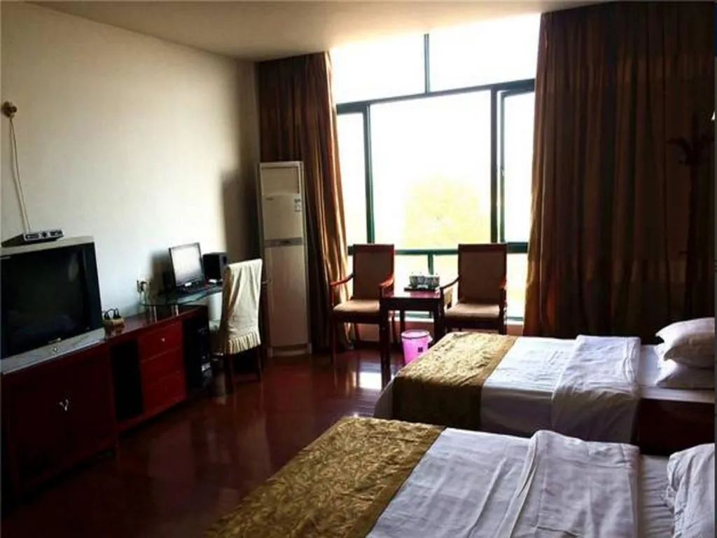 Bed in GreenTree Inn Shangrao Qianshan hekou old town Xinjiang longting shell hotel