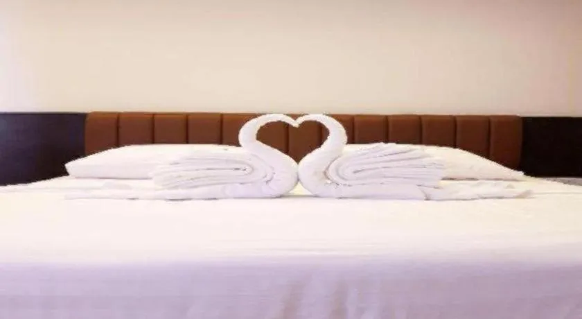 Bed in Karimun City Hotel