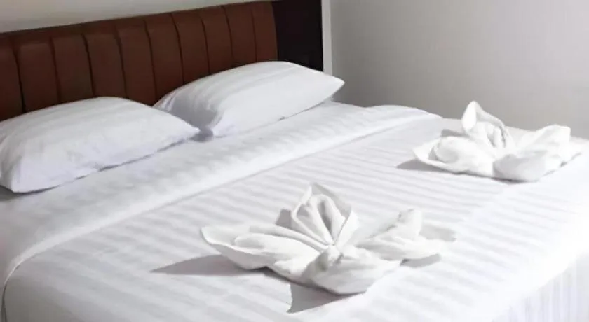 Bed in Karimun City Hotel