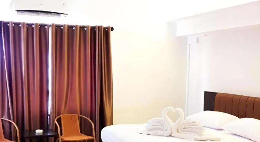 Bed in Karimun City Hotel