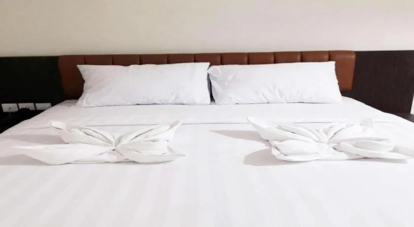 Bed in Karimun City Hotel