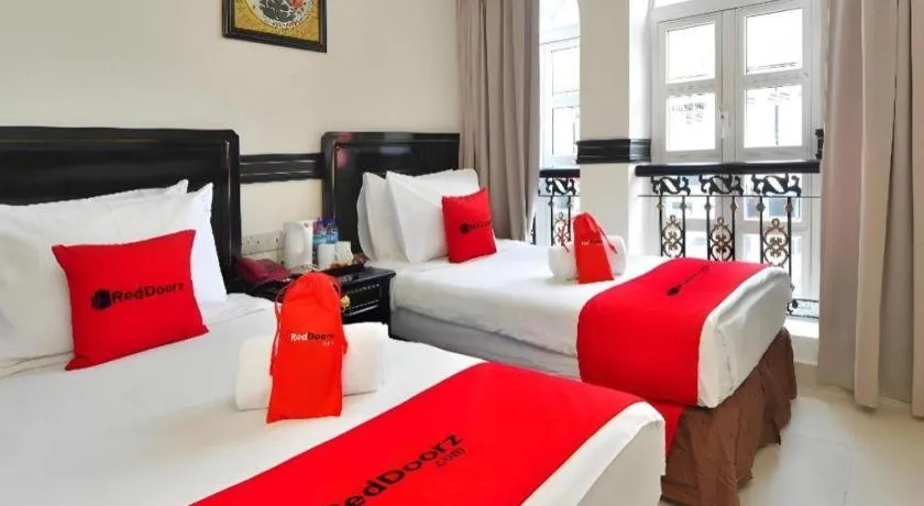 Bed in RedDoorz Hotel near Marine Parade Central