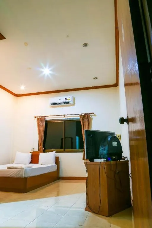 Bed in TAWANCHAY HOTEL PHATTHALUNG
