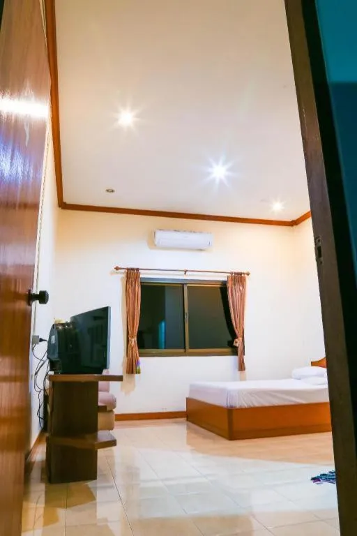 Bed in TAWANCHAY HOTEL PHATTHALUNG