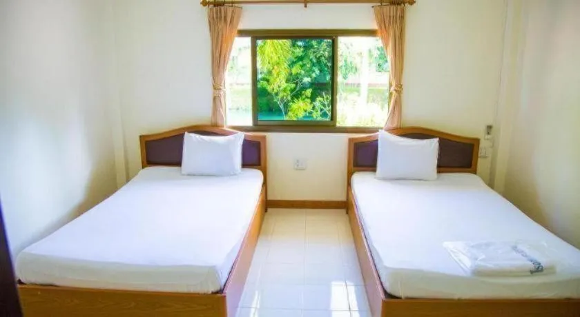 Bed in TAWANCHAY HOTEL PHATTHALUNG
