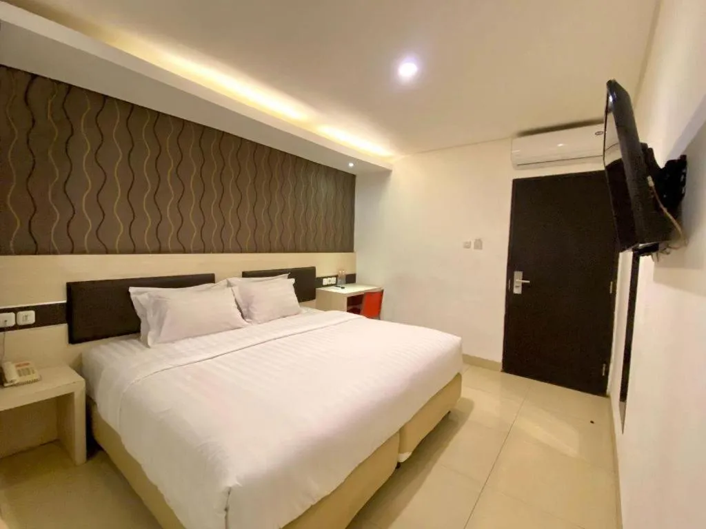 Bed in Sumi Hotel Surabaya
