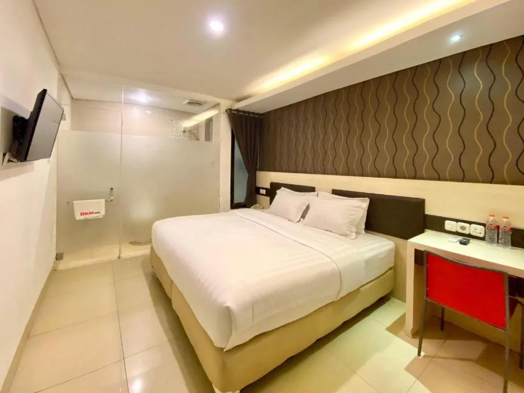 Bed in Sumi Hotel Surabaya