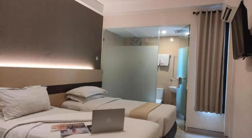 Bed in Sumi Hotel Surabaya