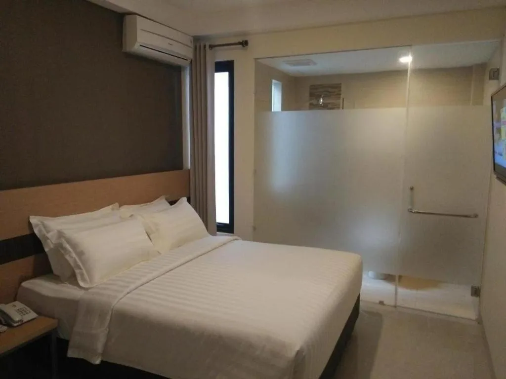 Bed in Sumi Hotel Surabaya