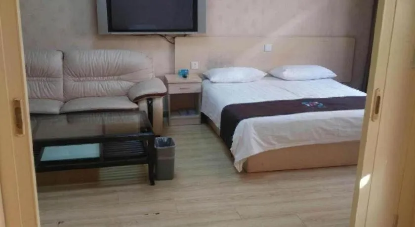 Bed in Pai Hotel Tianjin Binguan Metro Station Municipal Government