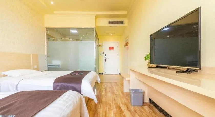 Bed in Pai Hotel Tianjin Binguan Metro Station Municipal Government