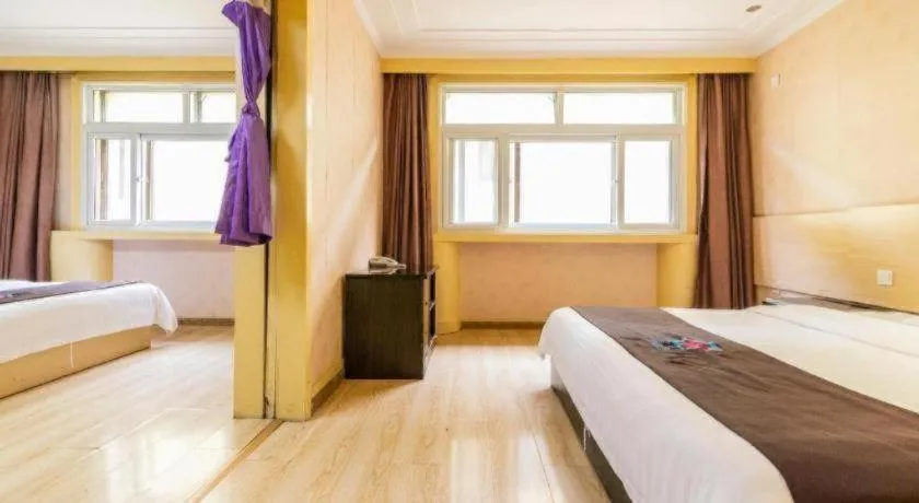 Bed in Pai Hotel Tianjin Binguan Metro Station Municipal Government