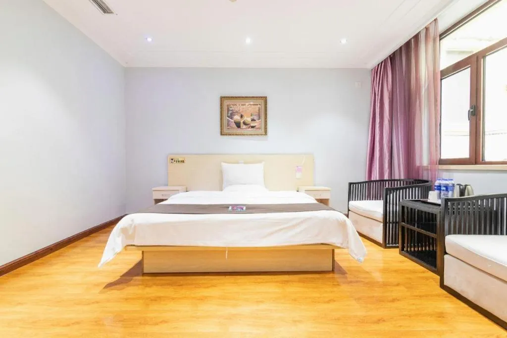 Bed in Pai Hotel Tianjin Binguan Metro Station Municipal Government