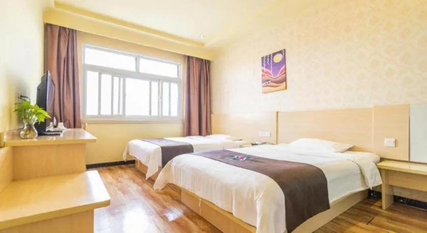 Bed in Pai Hotel Tianjin Binguan Metro Station Municipal Government