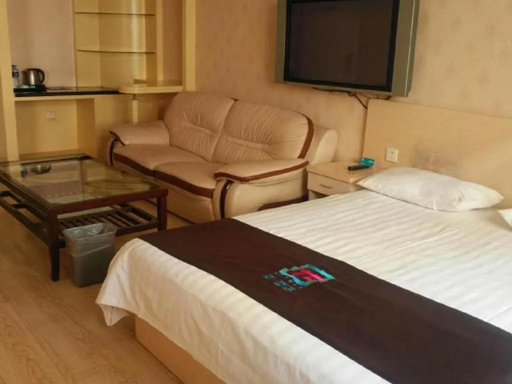 Bed in Pai Hotel Tianjin Binguan Metro Station Municipal Government
