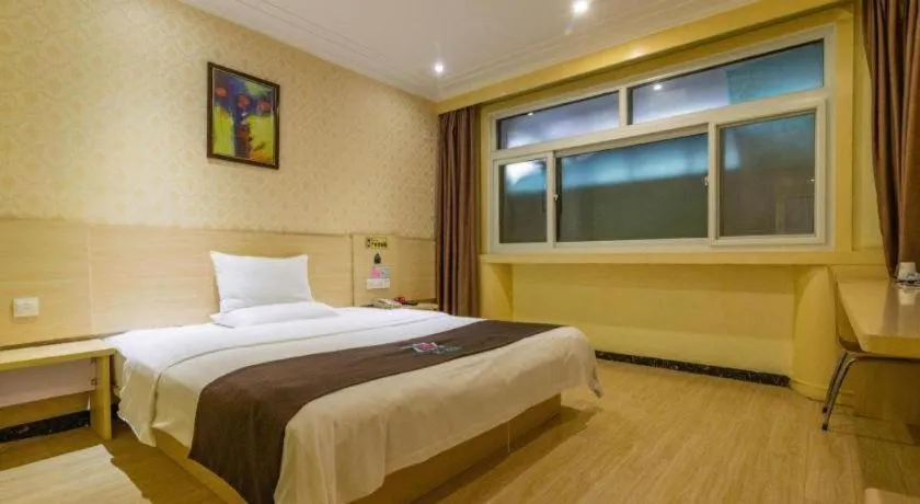 Bed in Pai Hotel Tianjin Binguan Metro Station Municipal Government