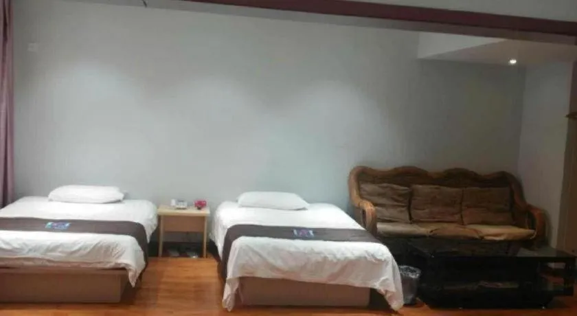 Bed in Pai Hotel Tianjin Binguan Metro Station Municipal Government