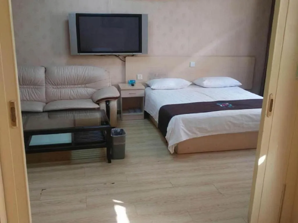 Bed in Pai Hotel Tianjin Binguan Metro Station Municipal Government