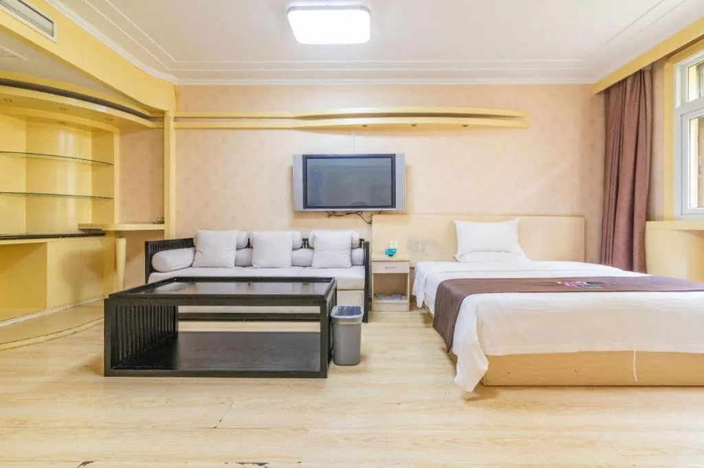 Bed in Pai Hotel Tianjin Binguan Metro Station Municipal Government