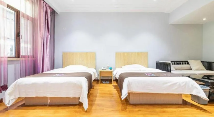 Bed in Pai Hotel Tianjin Binguan Metro Station Municipal Government