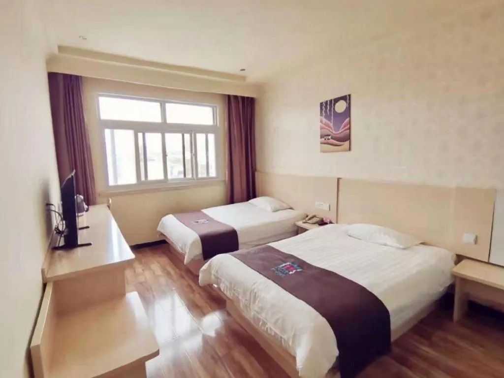 Bed in Pai Hotel Tianjin Binguan Metro Station Municipal Government