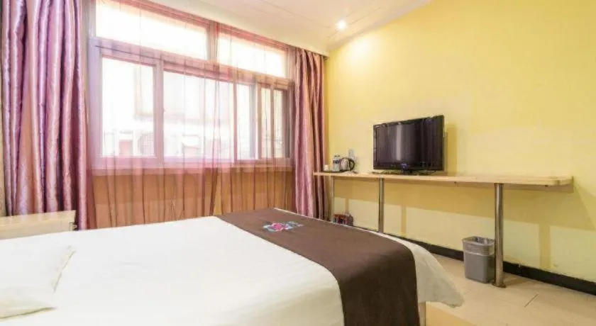 Bed in Pai Hotel Tianjin Binguan Metro Station Municipal Government