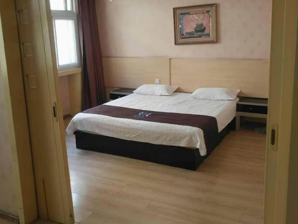 Bed in Pai Hotel Tianjin Binguan Metro Station Municipal Government