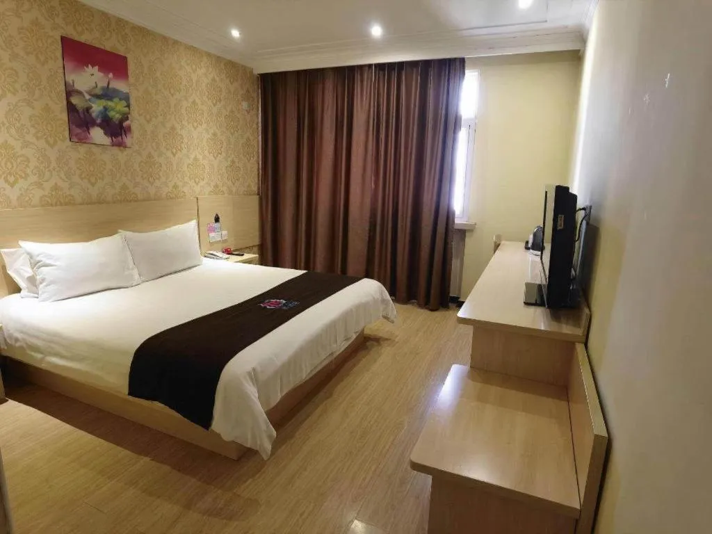 Bed in Pai Hotel Tianjin Binguan Metro Station Municipal Government