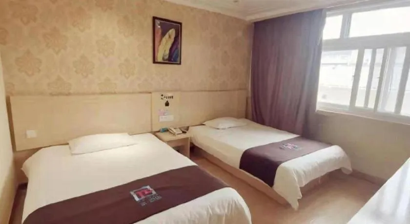 Bed in Pai Hotel Tianjin Binguan Metro Station Municipal Government