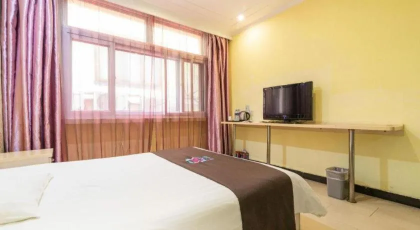 Bed in Pai Hotel Tianjin Binguan Metro Station Municipal Government