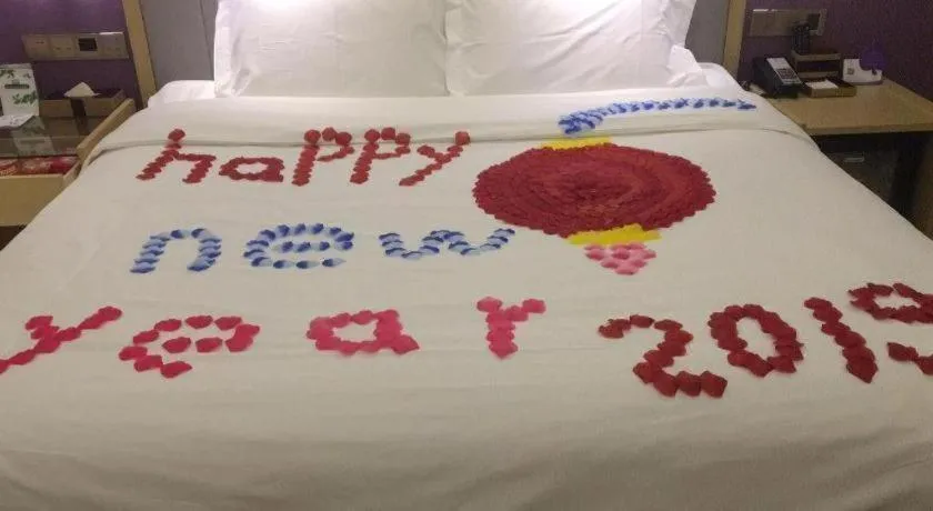 Bed in Lavande Hotel Beijing Olympic Village bird nest