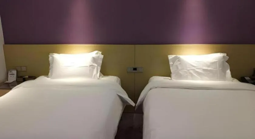 Bed in Lavande Hotel Beijing Olympic Village bird nest