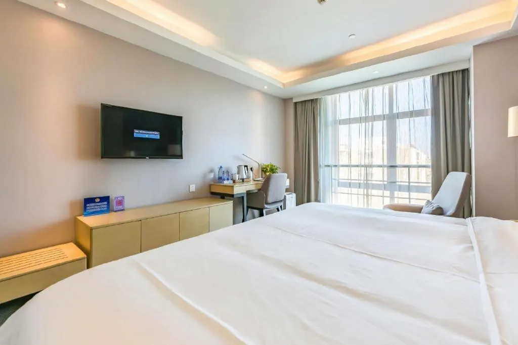 Bed in Lavande Hotel Beijing Olympic Village bird nest