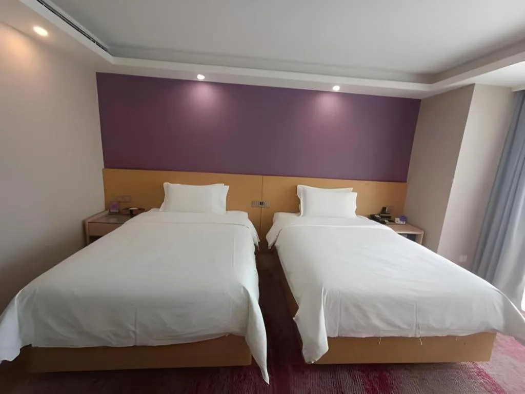 Bed in Lavande Hotel Beijing Olympic Village bird nest