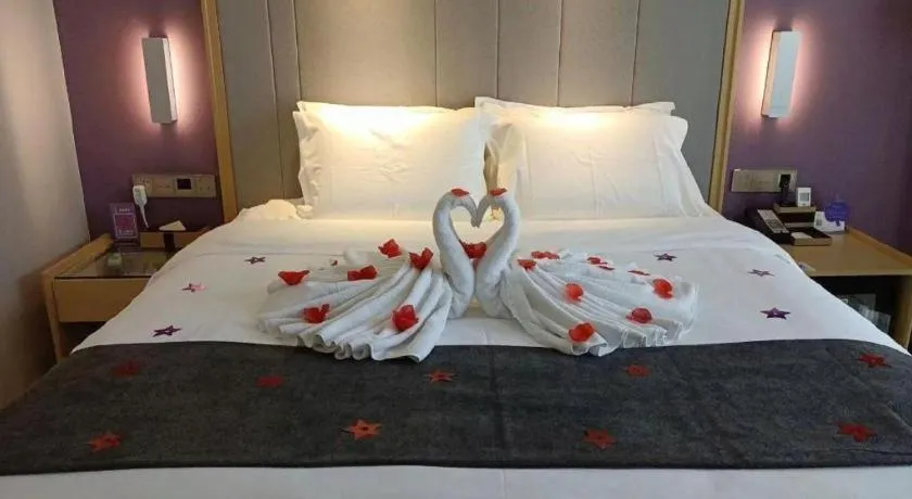 Bed in Lavande Hotel Beijing Olympic Village bird nest