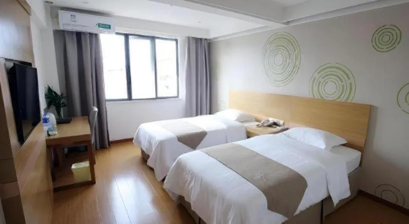 Bed in GreenTree Inn Xuancheng Jingxian Wannan First Street Express Hotel