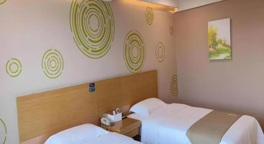 Bed in GreenTree Inn Xuancheng Jingxian Wannan First Street Express Hotel