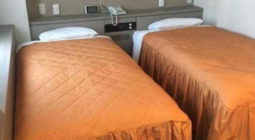 Bed in Hotel Suncity Ikebukuro