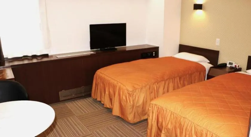 Bed in Hotel Suncity Ikebukuro