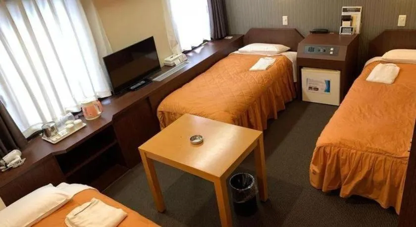 Bed in Hotel Suncity Ikebukuro