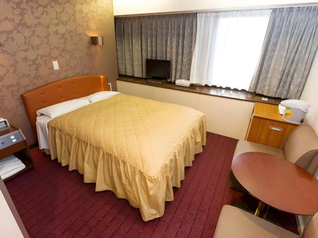 Bed in Hotel Suncity Ikebukuro