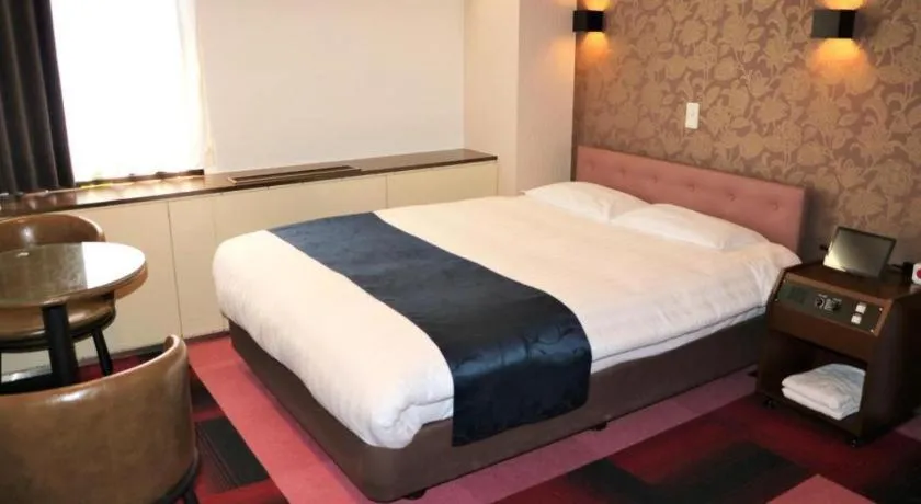 Bed in Hotel Suncity Ikebukuro