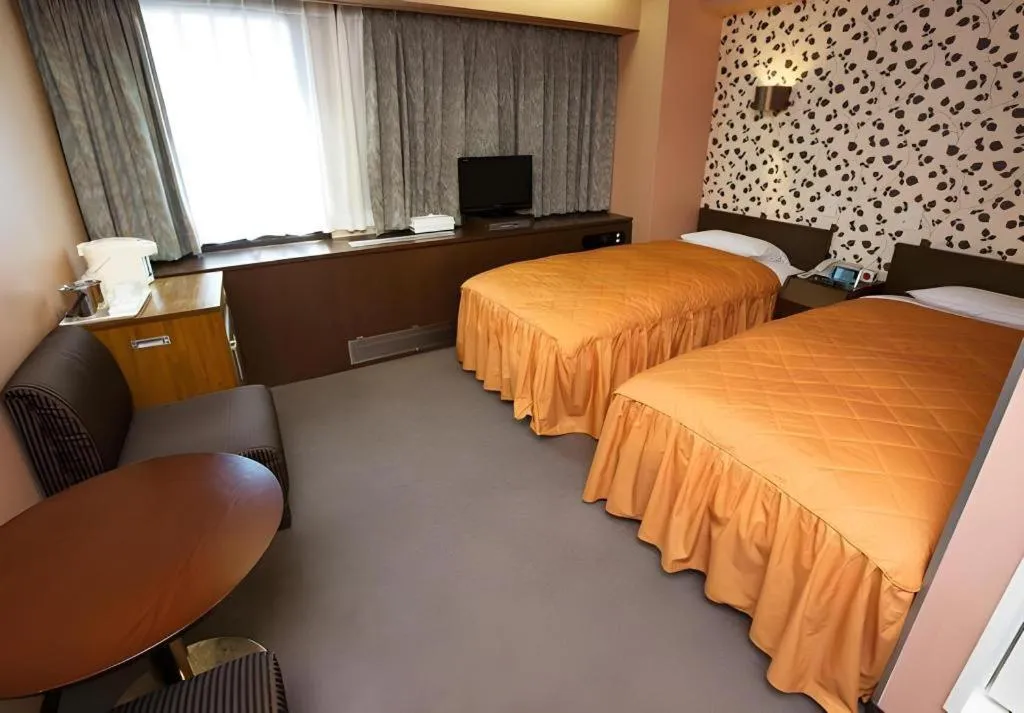 Bed in Hotel Suncity Ikebukuro