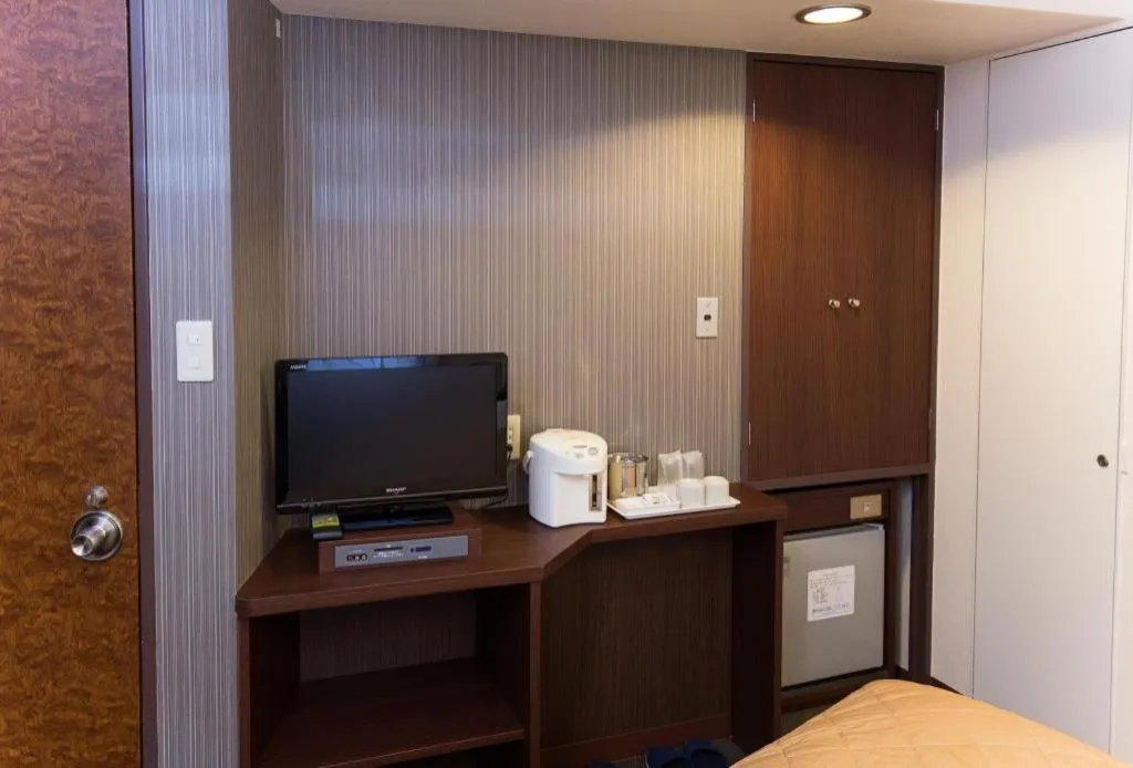 Bed in Hotel Suncity Ikebukuro