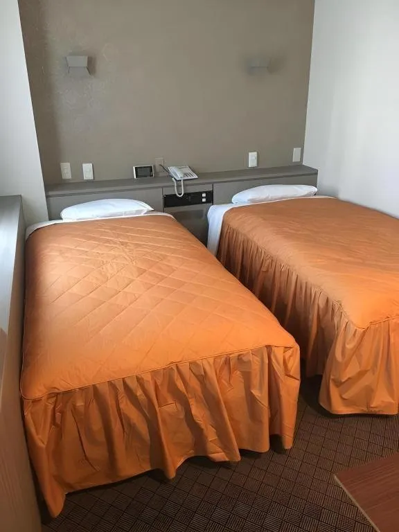 Bed in Hotel Suncity Ikebukuro