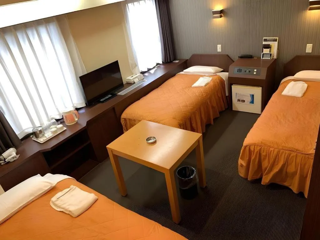 Bed in Hotel Suncity Ikebukuro