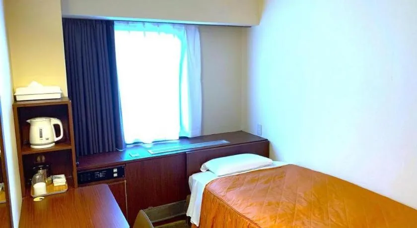 Bed in Hotel Suncity Ikebukuro